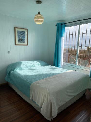 Postel nebo postele na pokoji v ubytování Beach house Pichilemu - Casa frente al mar