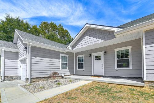 a house with a white at 2 Mi to Marina and Lake Cumberland! Newly Built Home in Somerset