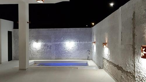 Der Swimmingpool an oder in der Nähe von Taiba House