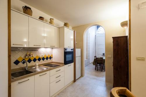 Una cocina o cocineta en Tre Volte Belle