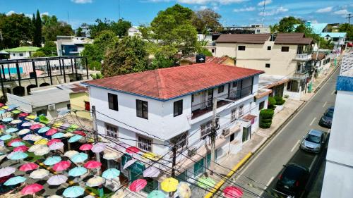 an overhead view of a city with umbrellas at Brisas de Jarabacoa in Jarabacoa