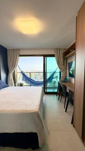 Postel nebo postele na pokoji v ubytování Studio Premium no Meireles - a 500 m da Beira Mar