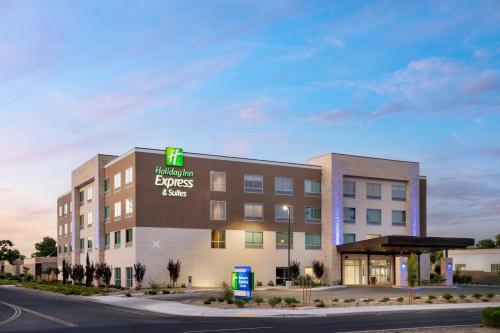 a rendering of a hotel with a building at Holiday Inn Express & Suites Fresno Airport by IHG in Fresno