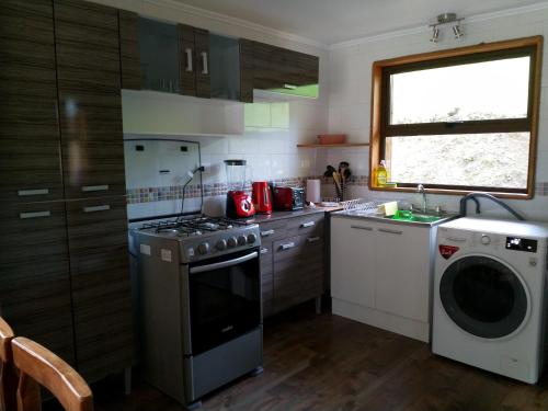 Dapur atau dapur kecil di Ranco Lodge