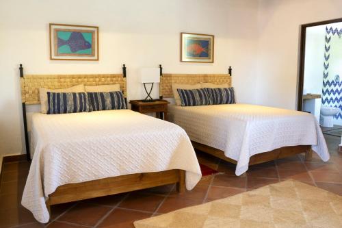 Postel nebo postele na pokoji v ubytování Hotel Casa Corazón Malinalco