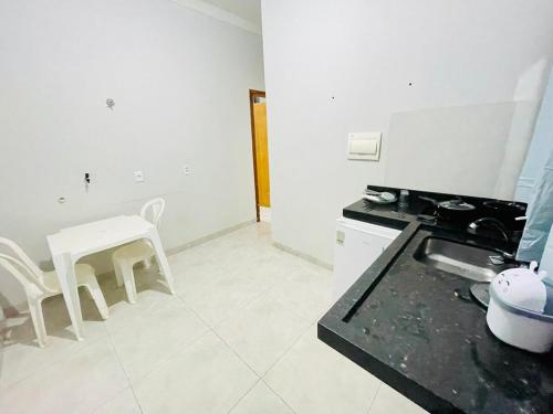 Η κουζίνα ή μικρή κουζίνα στο Apartamento 2, ate 5 pessoas