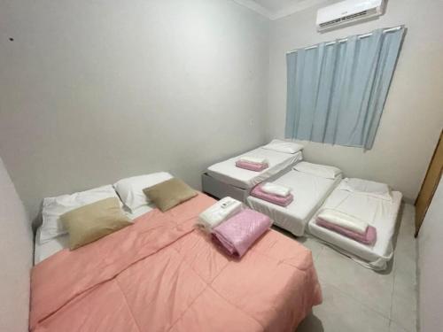 Ένα ή περισσότερα κρεβάτια σε δωμάτιο στο Apartamento 2, ate 5 pessoas
