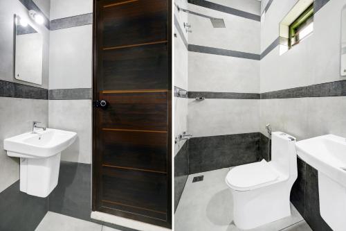 Koupelna v ubytování Hotel O EVA RESIDENCY