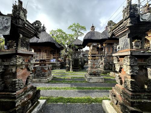 a group of buildings with stairs in front of them at 1 Br Ruang Tenang Ubud, Great Location in Ubud