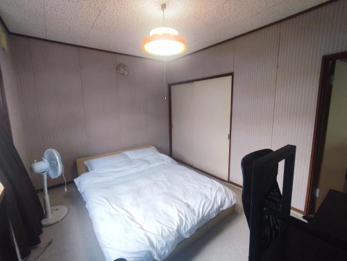 Moio Homestayにあるベッド