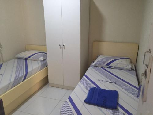 Katil atau katil-katil dalam bilik di Hospedagem Municipal