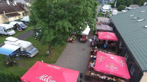 an overhead view of a market with tents and vendors at Konse Motel and Caravan Camping in Pärnu