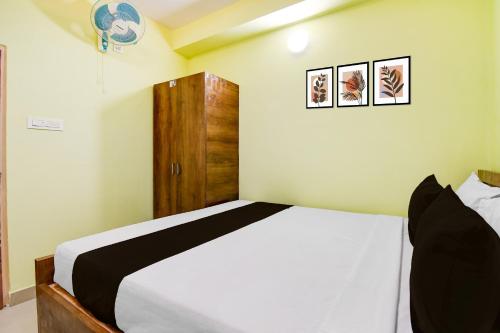 Ένα ή περισσότερα κρεβάτια σε δωμάτιο στο Hotel O Ruposhi bangla guest house