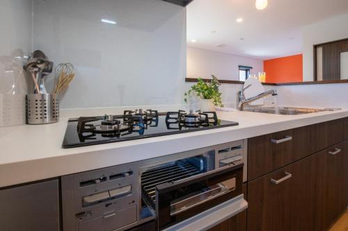 Nhà bếp/bếp nhỏ tại Kanawa Apartment - Vacation STAY 49655v