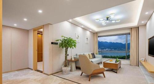 TV a/nebo společenská místnost v ubytování Yichang Three Gorges Project Hotel