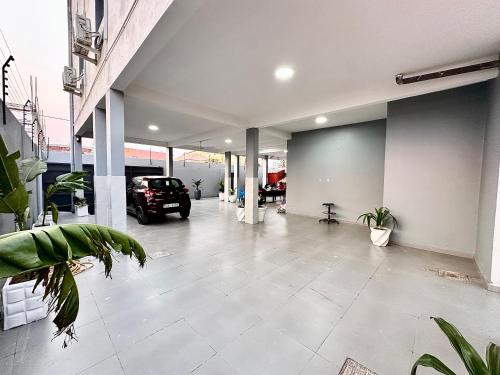 a garage with a car parked inside of it at Comfort zone in Futungo de Belas