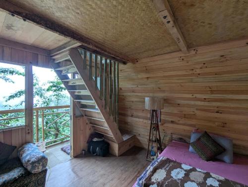 Postel nebo postele na pokoji v ubytování Mochileros Cherry Tree House