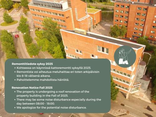 a building with a sign on the side of it at Hiisi Homes Helsinki Haaga in Helsinki