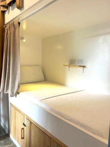 Ein Bett oder Betten in einem Zimmer der Unterkunft Blau Hostel