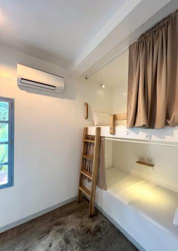 Ein Bett oder Betten in einem Zimmer der Unterkunft Blau Hostel