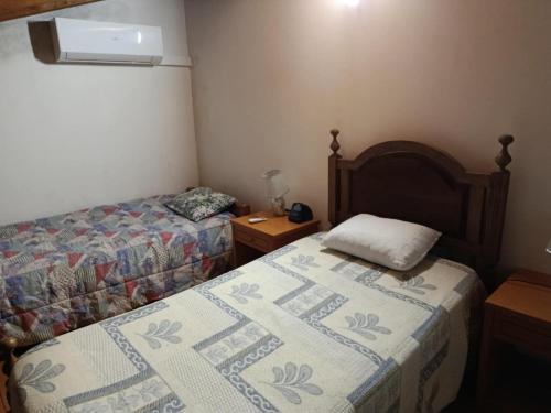 Ένα ή περισσότερα κρεβάτια σε δωμάτιο στο Casa Lopes