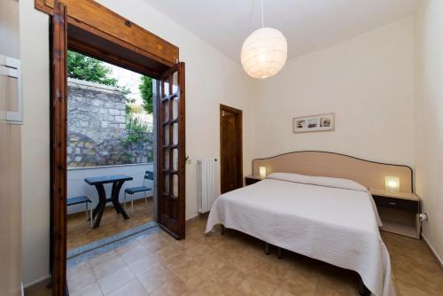 Postelja oz. postelje v sobi nastanitve Casa Di Meglio Dependance