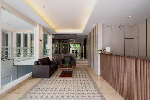 Χώρος καθιστικού στο Sans Vibes Jasmine Suite TB Simatupang