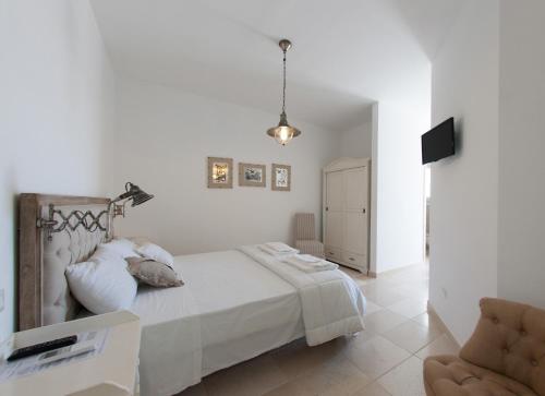 A bed or beds in a room at B&B Villa Cinzia