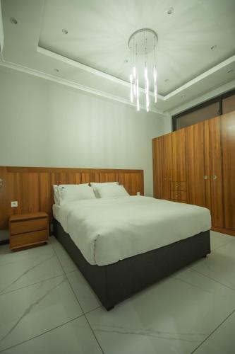 Ein Bett oder Betten in einem Zimmer der Unterkunft Ultra Aparthotel