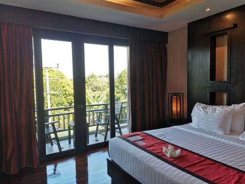 Voodi või voodid majutusasutuse Yodia Heritage Hotel toas