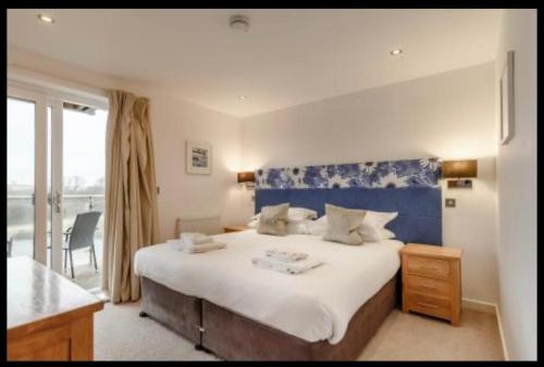 En eller flere senge i et værelse på Tallyn House 202