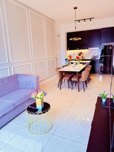 a living room with a couch and a table at Luxury Axon Residence Bukit Bintang KLCC 2 Minutes Walking PAVILION in Kuala Lumpur