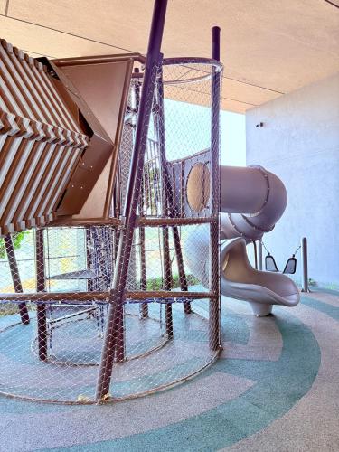 a playground with a slide and a slide at Luxury Axon Residence Bukit Bintang KLCC 2 Minutes Walking PAVILION in Kuala Lumpur