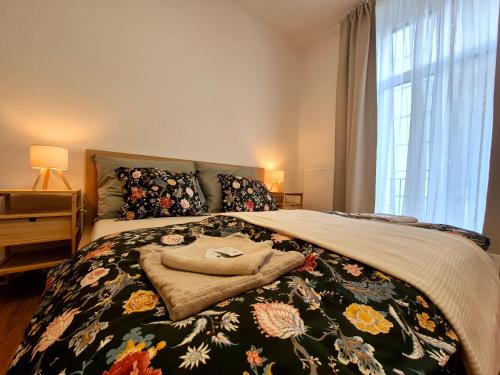 Giường trong phòng chung tại City Center Apartments - Měšťanský dům Minoritská