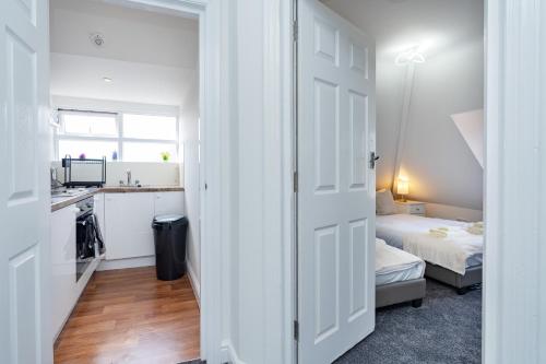 Ένα ή περισσότερα κρεβάτια σε δωμάτιο στο Open Mind Property - 8 Guests & Free Parking