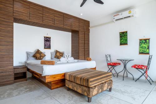 Giường trong phòng chung tại Villa Florida Calme Tropical Grande Piscine