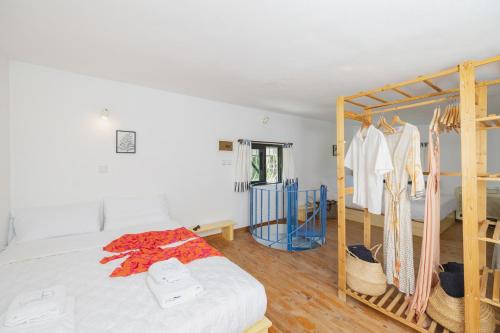Postel nebo postele na pokoji v ubytování Eco Beachfront Villa