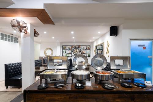 a hair salon with several sinks and mirrors at Arawana Regency North Pattaya in Pattaya Central