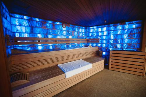 a room with a sauna with blue lights at The Phoenicia Malta - The Leading Hotels of the World in Valletta