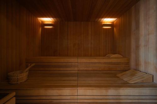 a sauna with two beds and a basket in it at The Phoenicia Malta - The Leading Hotels of the World in Valletta