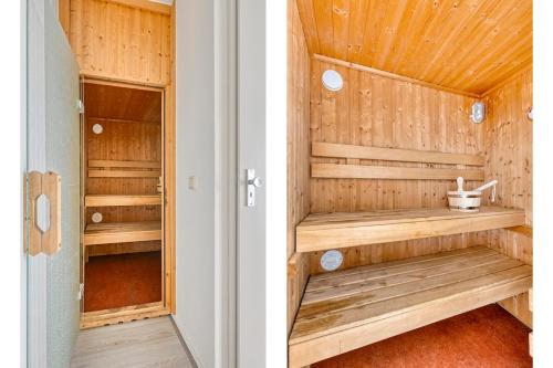 a wooden sauna with wooden shelves in a room at Vakantiehuis - Brabantse gezelligheid met sauna VP098 in Hoeven