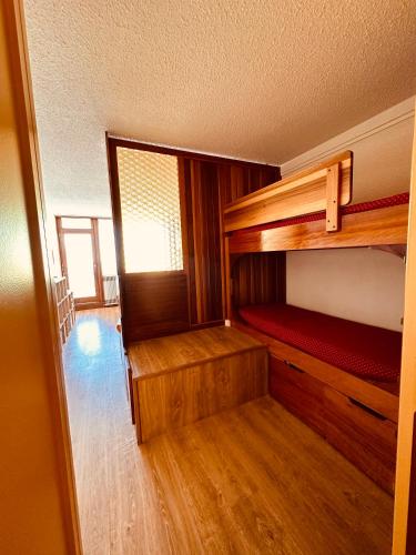 Llit o llits en una habitació de Studio 4 pers Roche Béranger