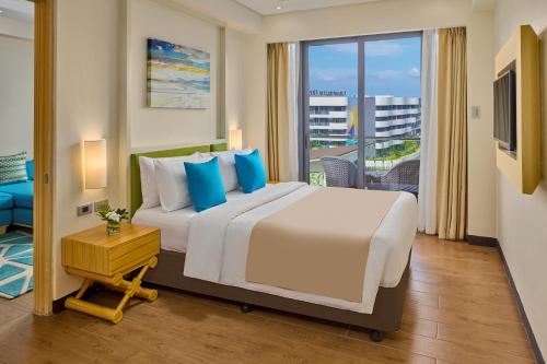 Cama o camas de una habitación en Savoy Hotel Boracay near Newcoast Beach
