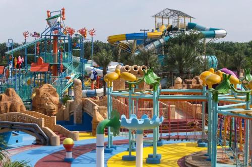 a water park with a water slide at CornerNest Bertam Homestay in Kepala Batas