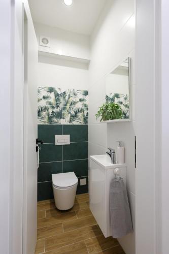 Ванная комната в La Vida Green Apartman Hajdúszoboszló