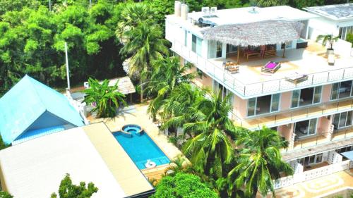 an aerial view of a resort with a swimming pool at Phuket Arkadia Home in Nai Harn Beach