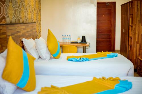 Centric Hotelにあるベッド