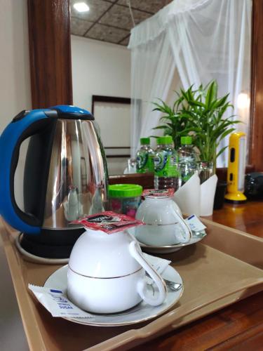 Příslušenství pro přípravu čaje a kávy v ubytování V@Ella guesthouse