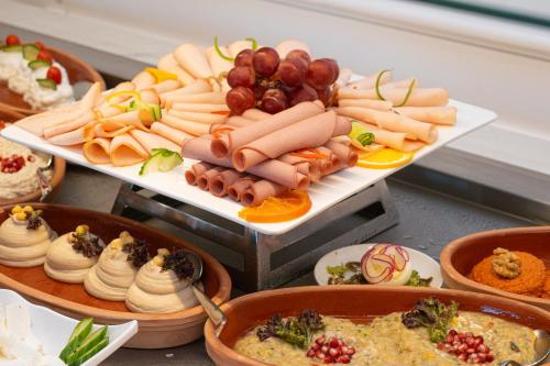 a buffet with a lot of different types of food at Best Western Plus Jeddah Hotel Madinah Road in Jeddah
