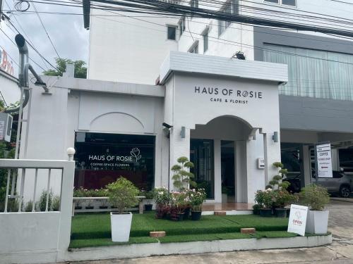 a white building with a sign that reads halls of rescue at Shade House - Bitec Bangna in Bangkok